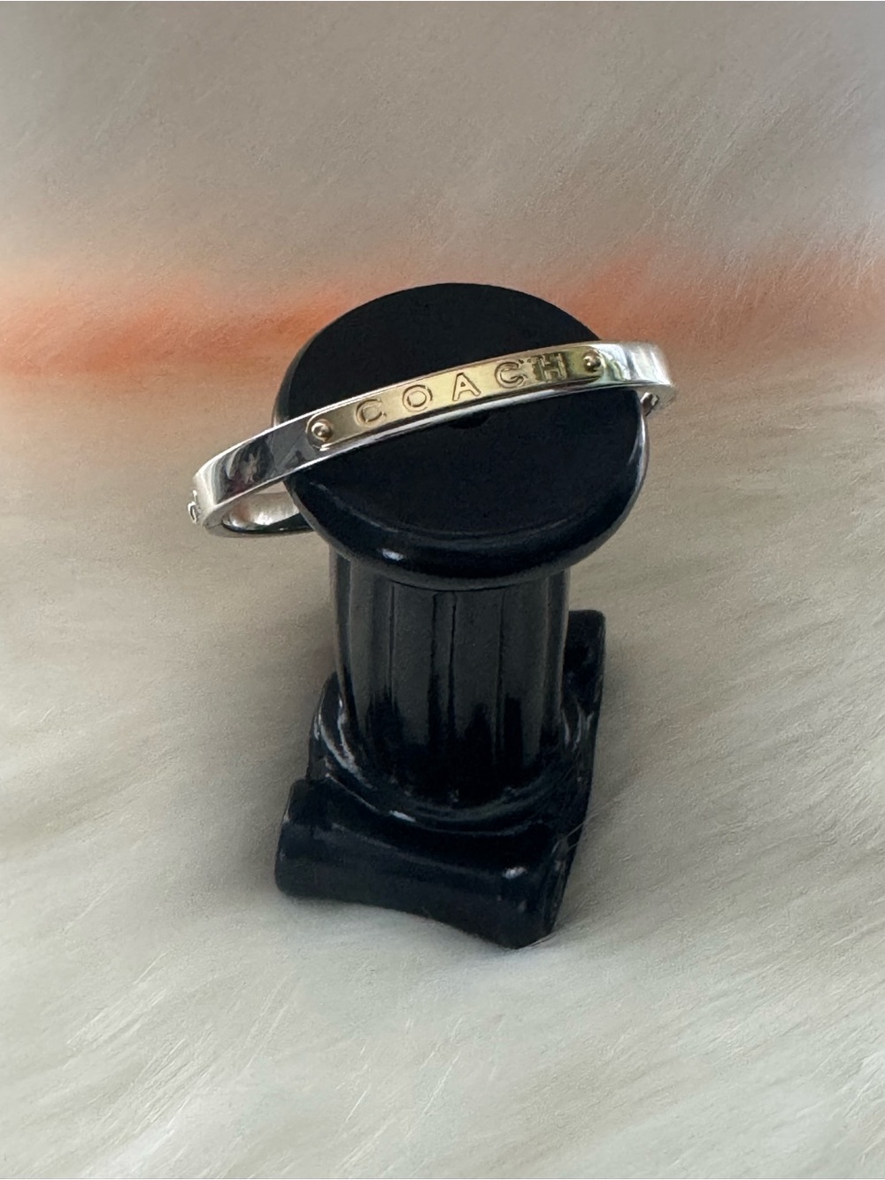 Coach Silver-Tone Logo Hinged Bangle Bracelet with Stud Accents